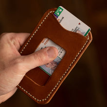 Load image into Gallery viewer, buck brown leather minimalist wallet sliding id out of id slot
