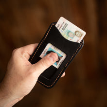 Load image into Gallery viewer, black and buck brown minimalist wallet with id sliding out
